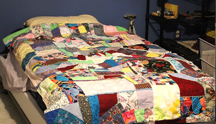 crazy quilt on a bed