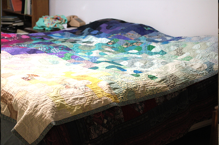 quilts on a bed