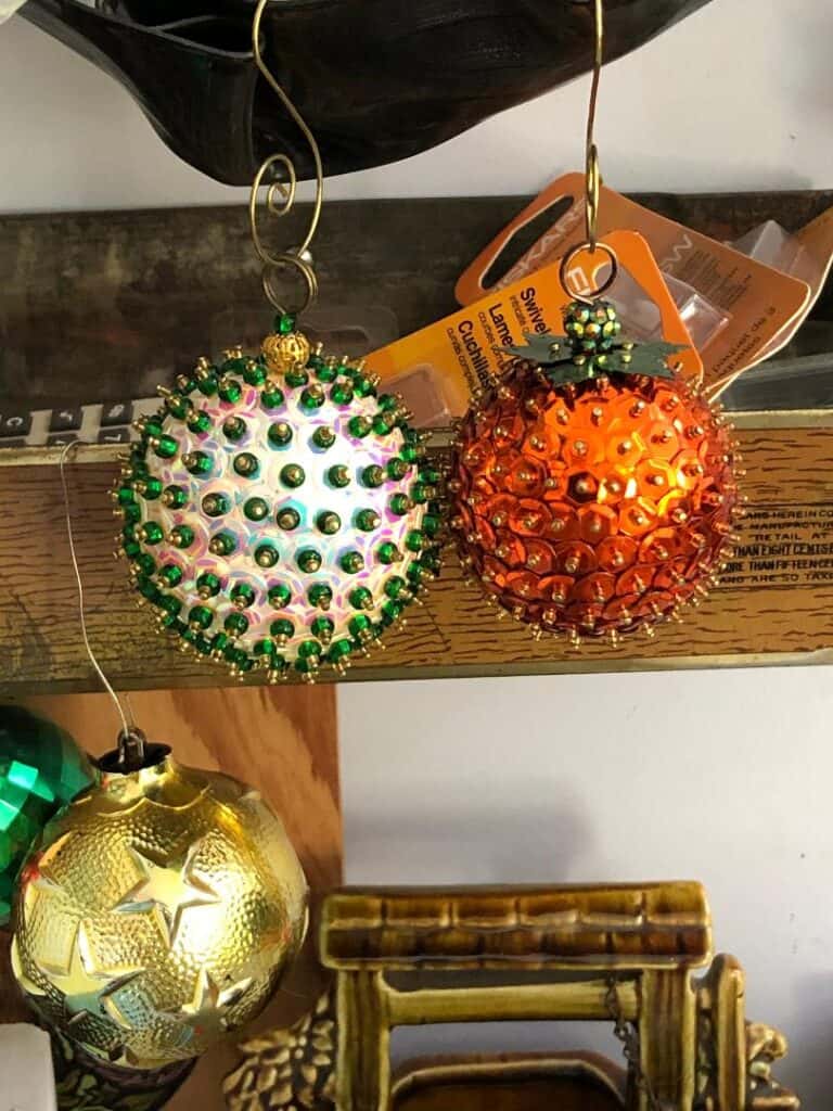 white and orange bead and sequin ornaments