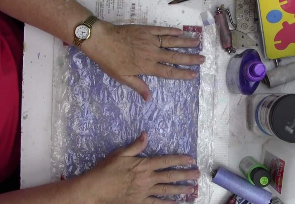adding texture to the gel plate with bubble wrap