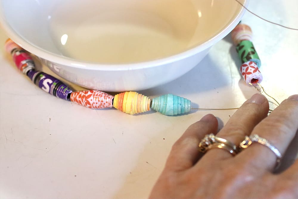 Wrap the wired beads around the base of the bowl to fit.
