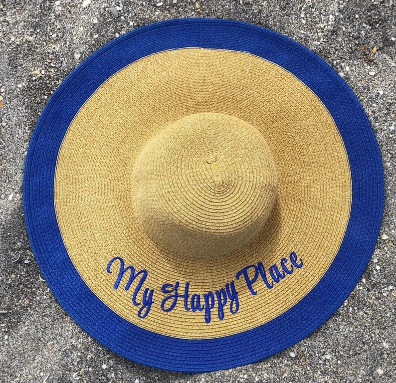 Sunhat with My Happy Place embroidered on it