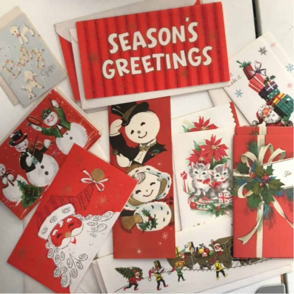 Photo of vintage Christmas cards that could be used to make a junk journal.