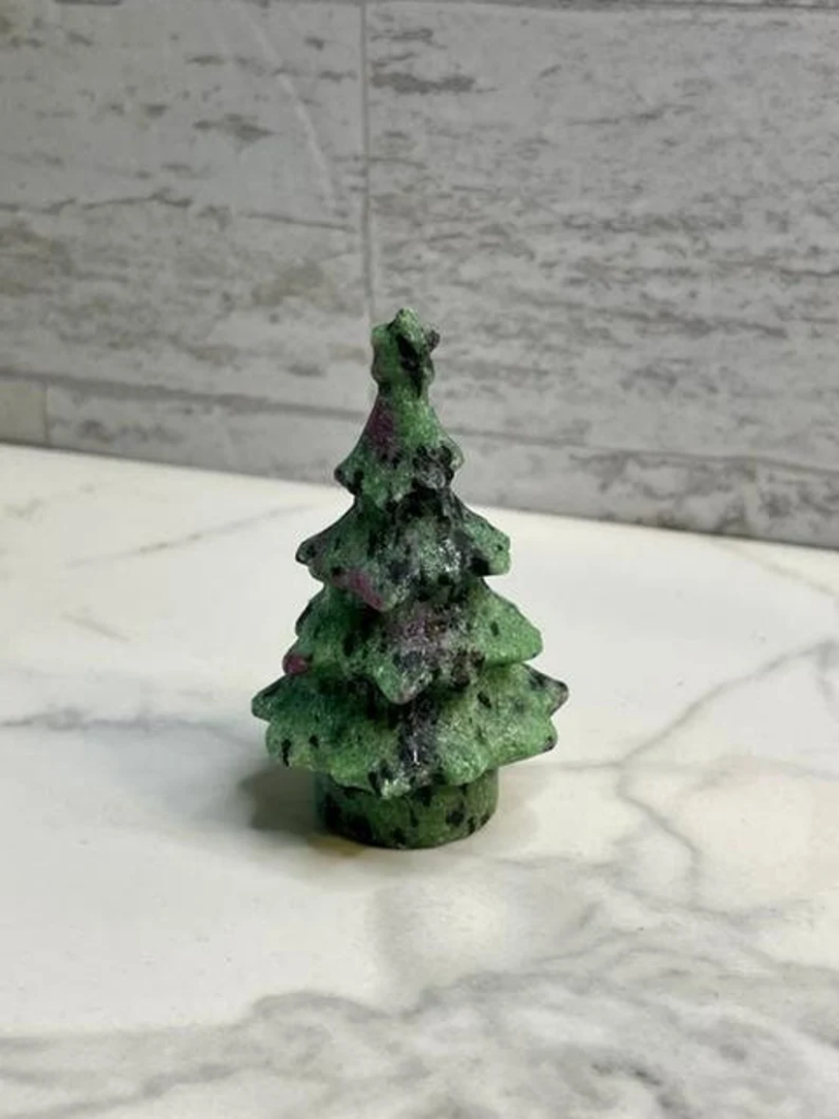 gem in the shape of a christmas tree