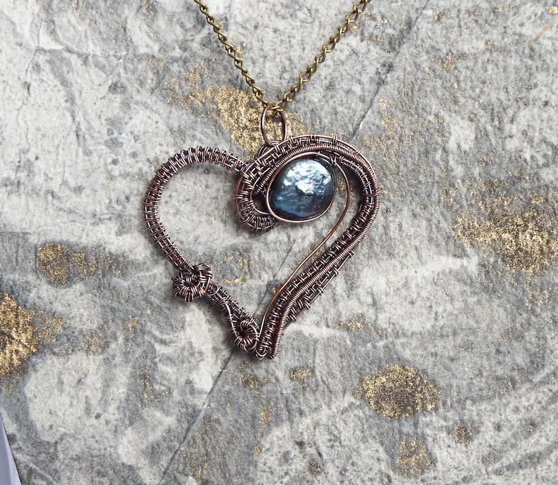 heart pendant with blue stone