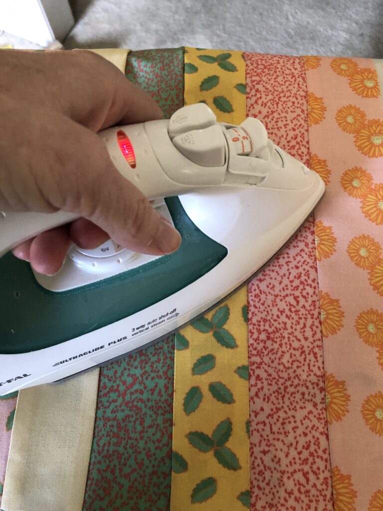 Ironing the strip panel pieces
