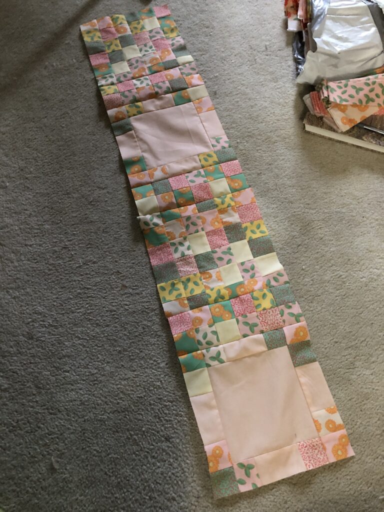 the main quilt top section with two types of blocks