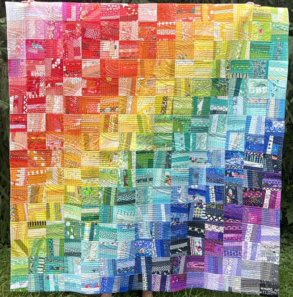 scrap quilt in rainbow colors