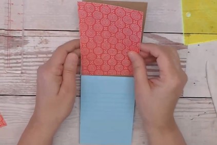 attach the other sheets of paper to the inside of the notebook