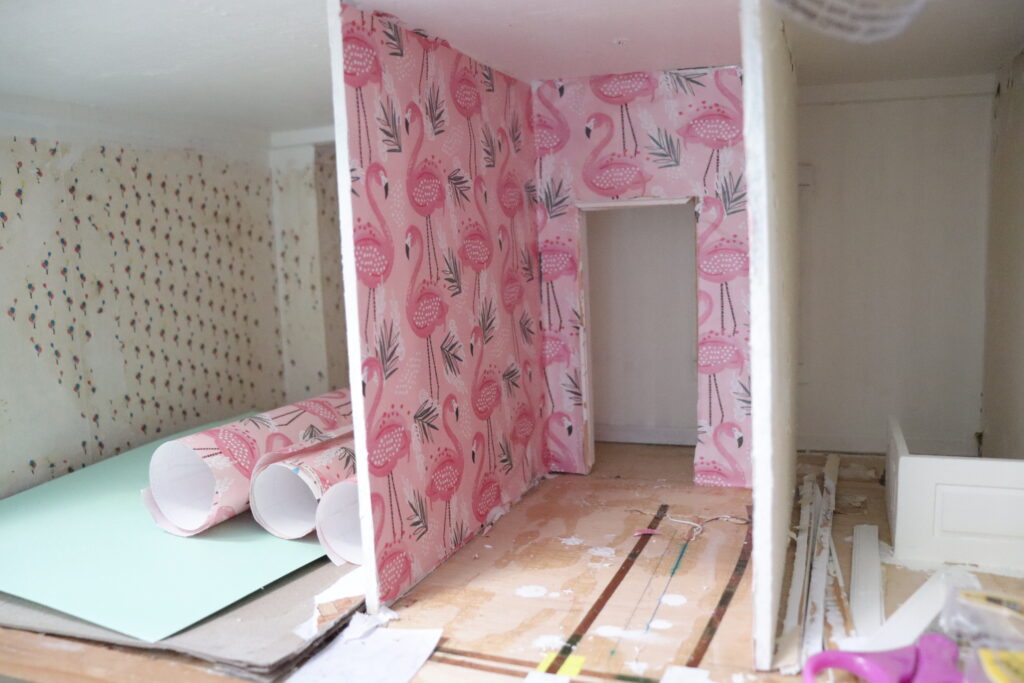 flamingo wallpaper in a dollhouse