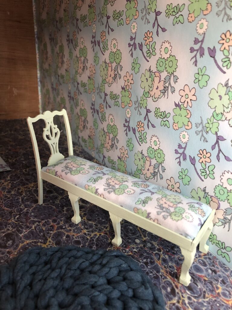 dollhouse furniture and matching wallpaper