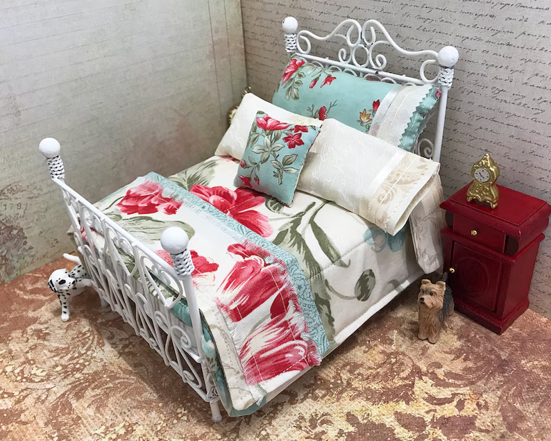 mini dollhouse bedding on  a bed