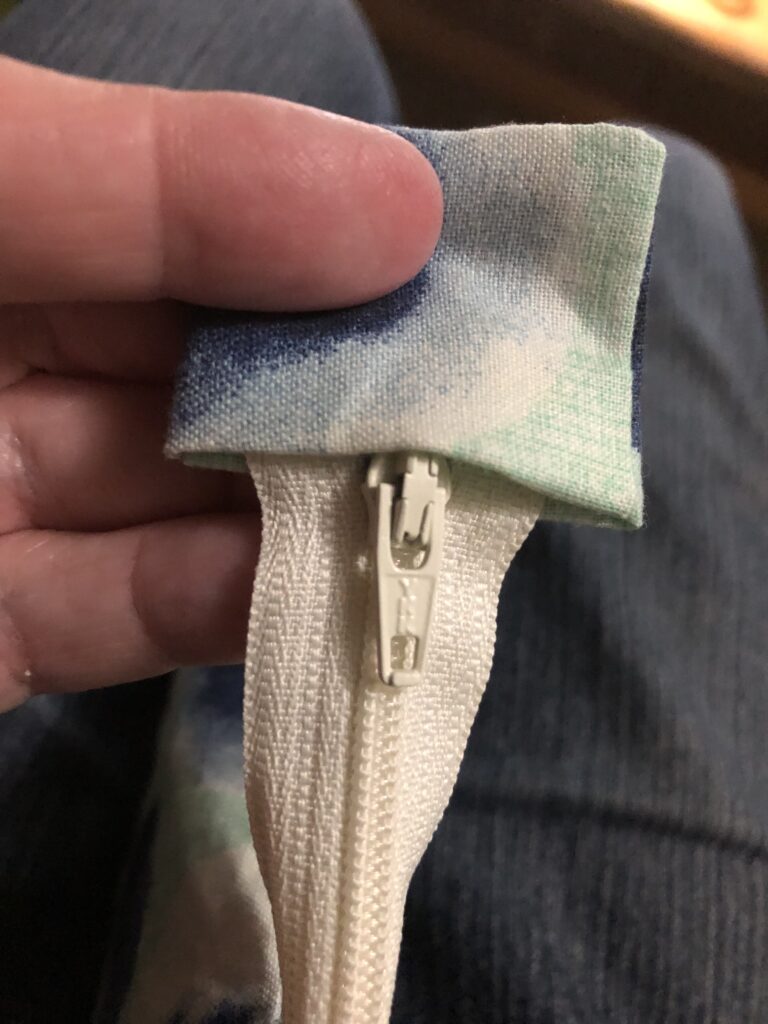 fabric tab on a zipper ready to sew
